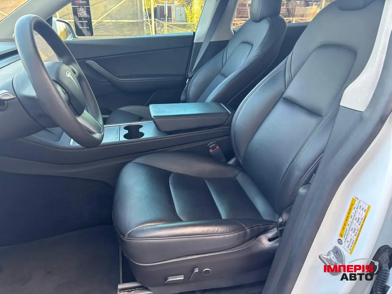 Tesla Model Y - фото 9