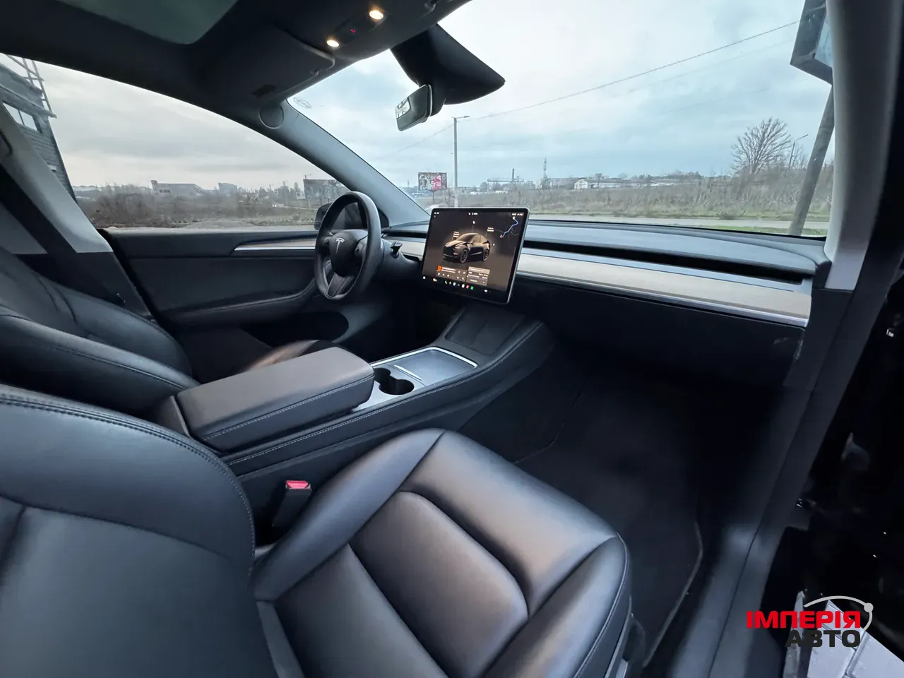 Tesla Model Y - фото 38