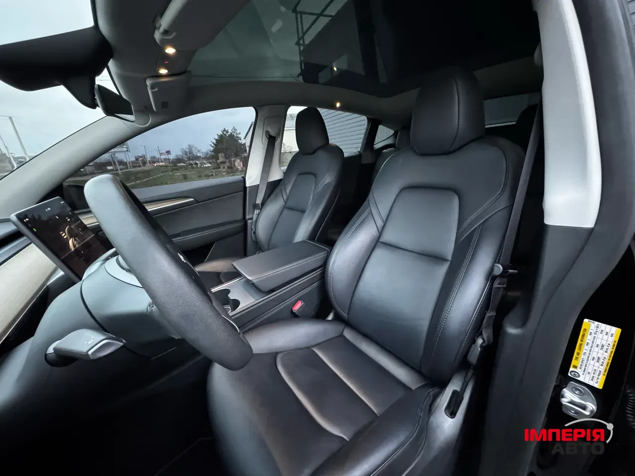 Tesla Model Y - фото 18