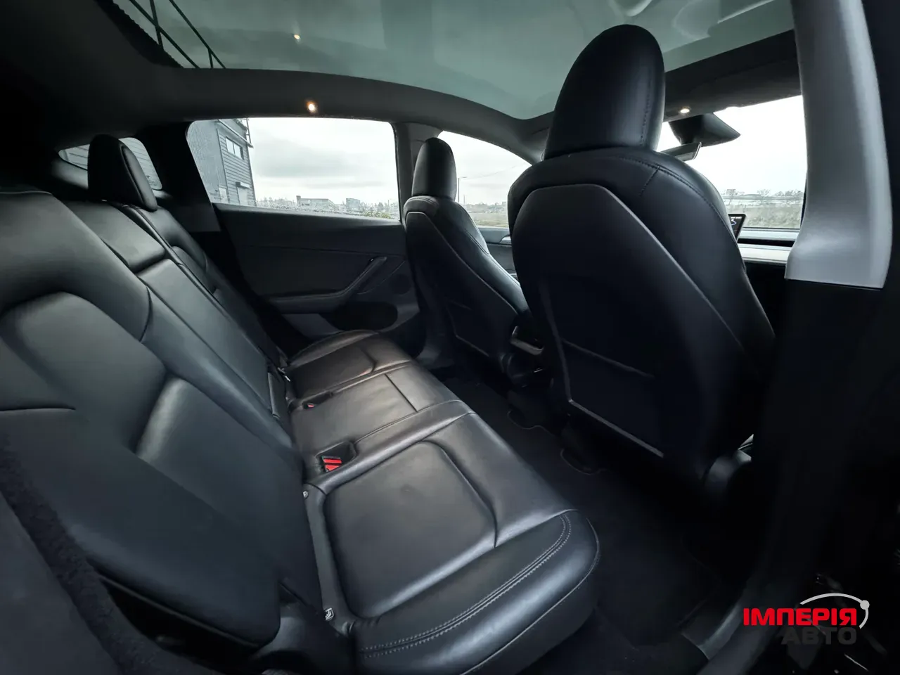 Tesla Model Y - фото 35