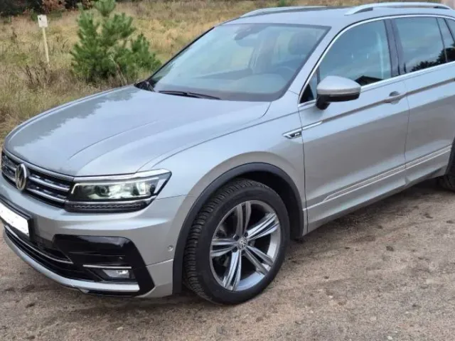 Volkswagen Tiguan - фото 1