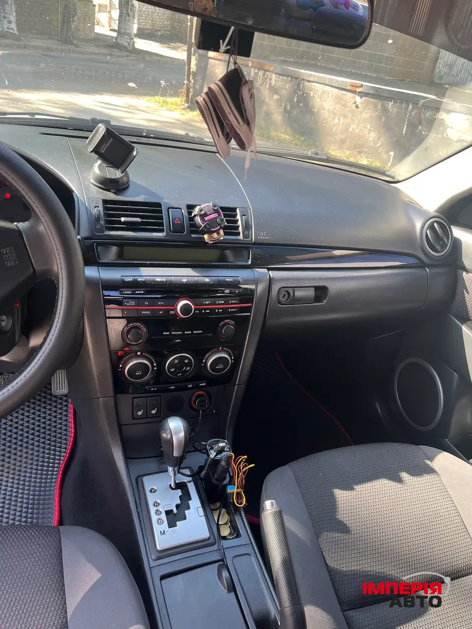 Mazda 3 - фото 24