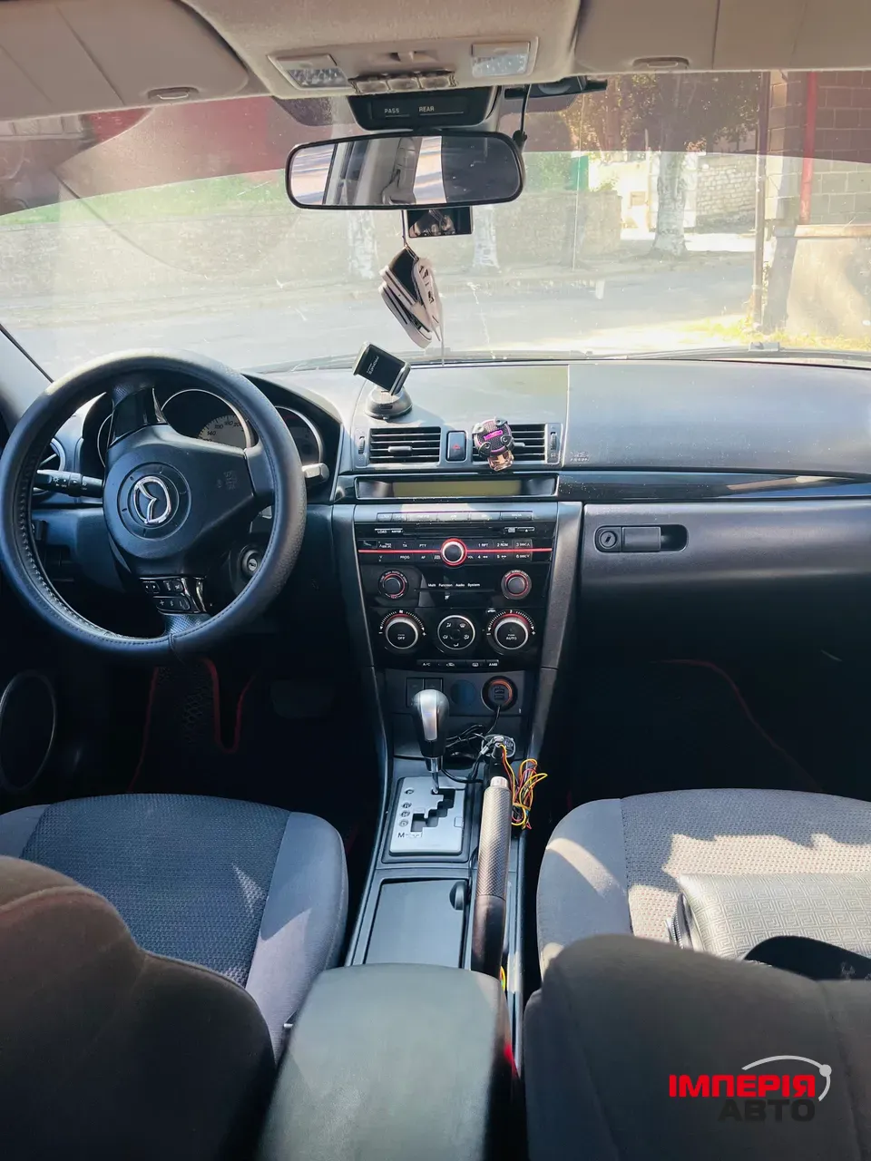 Mazda 3 - фото 15