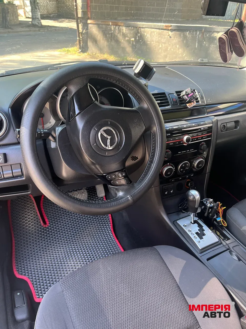 Mazda 3 - фото 23