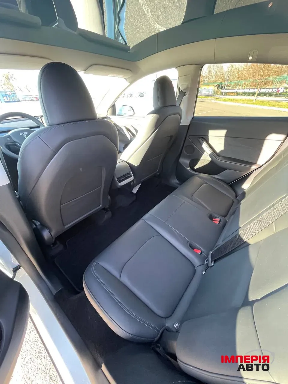 Tesla Model Y - фото 12