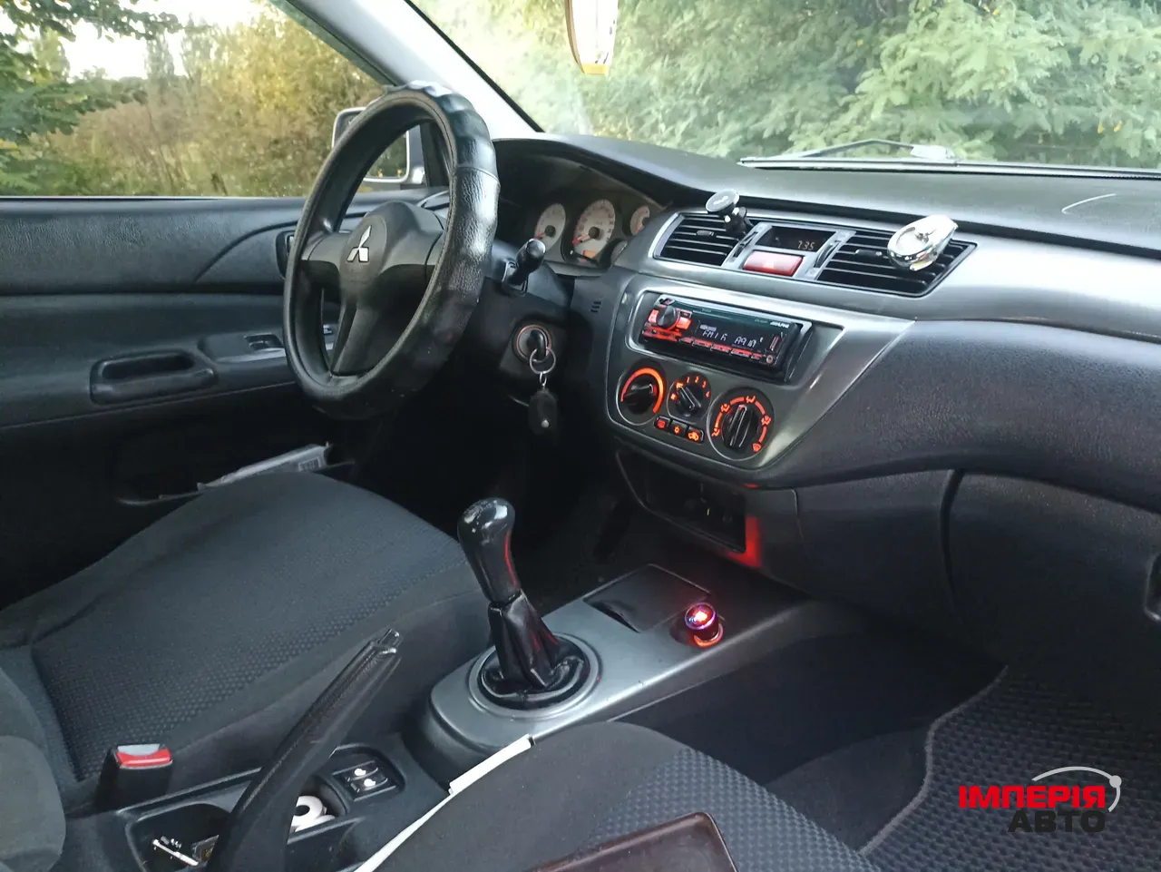 Mitsubishi Lancer - фото 7