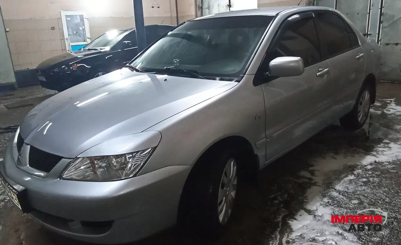 Mitsubishi Lancer - фото 4
