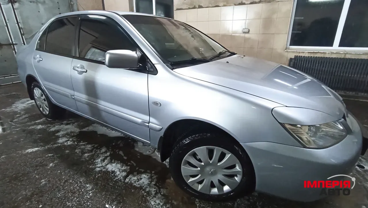 Mitsubishi Lancer - фото 1