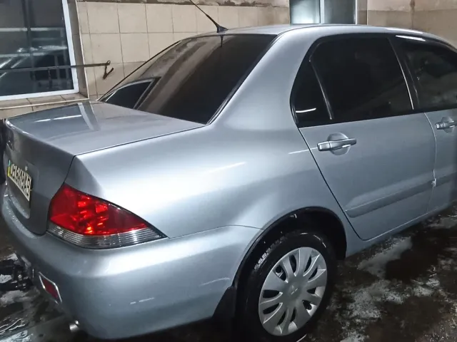 Mitsubishi Lancer - фото 3