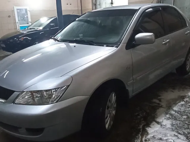Mitsubishi Lancer - фото 4