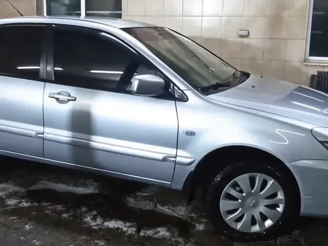 Mitsubishi Lancer - фото 5