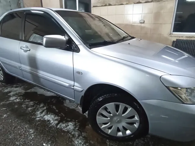 Mitsubishi Lancer - фото 1
