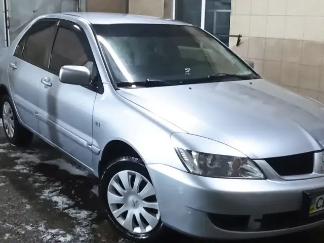 Mitsubishi Lancer - фото 2