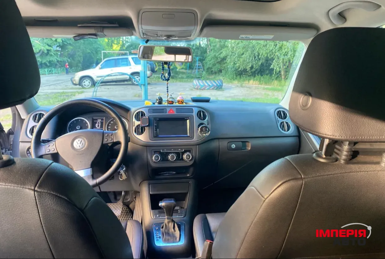 Volkswagen Tiguan - фото 2
