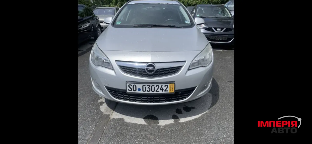 Opel Astra - фото 1
