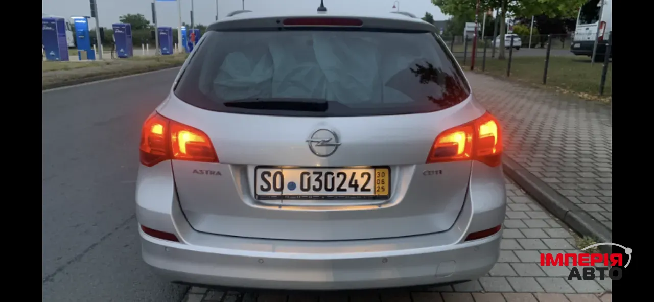 Opel Astra - фото 5