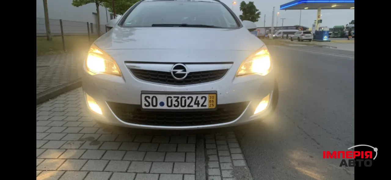 Opel Astra - фото 7
