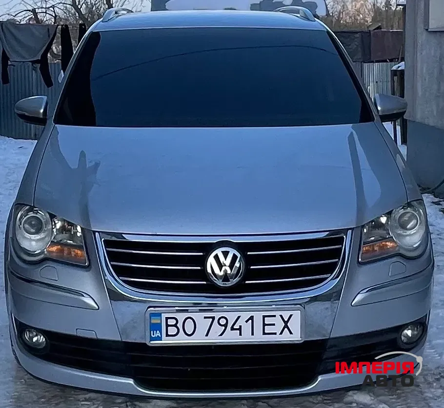 Volkswagen Touran - фото 4