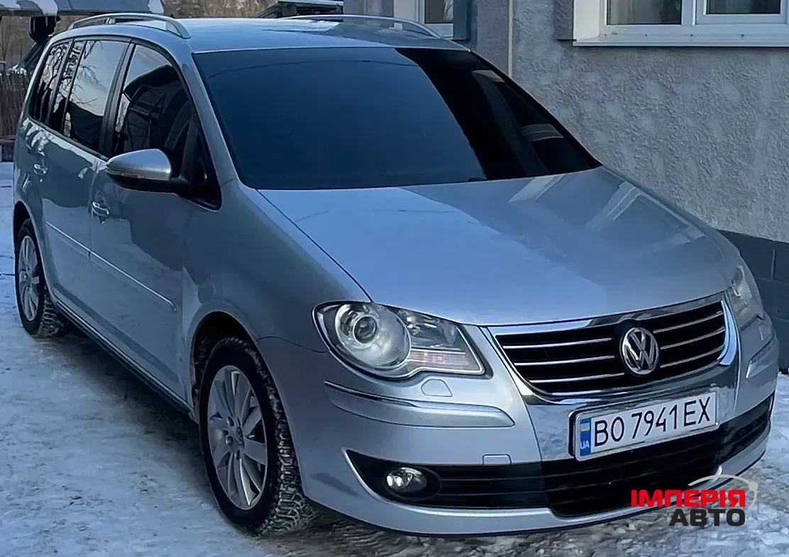 Volkswagen Touran - фото 5