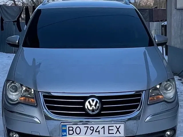 Volkswagen Touran - фото 4