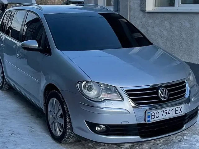 Volkswagen Touran - фото 5