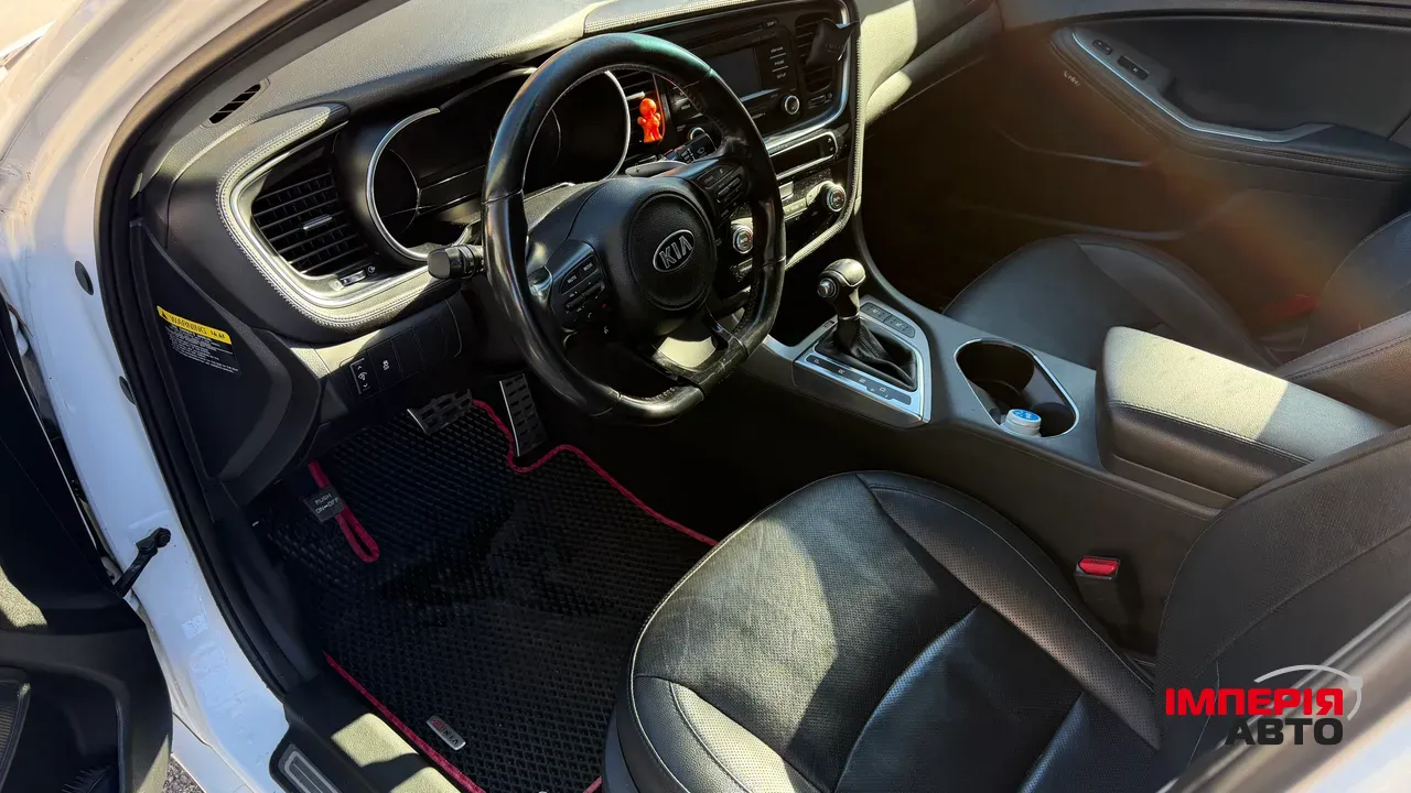 Kia Optima - фото 5