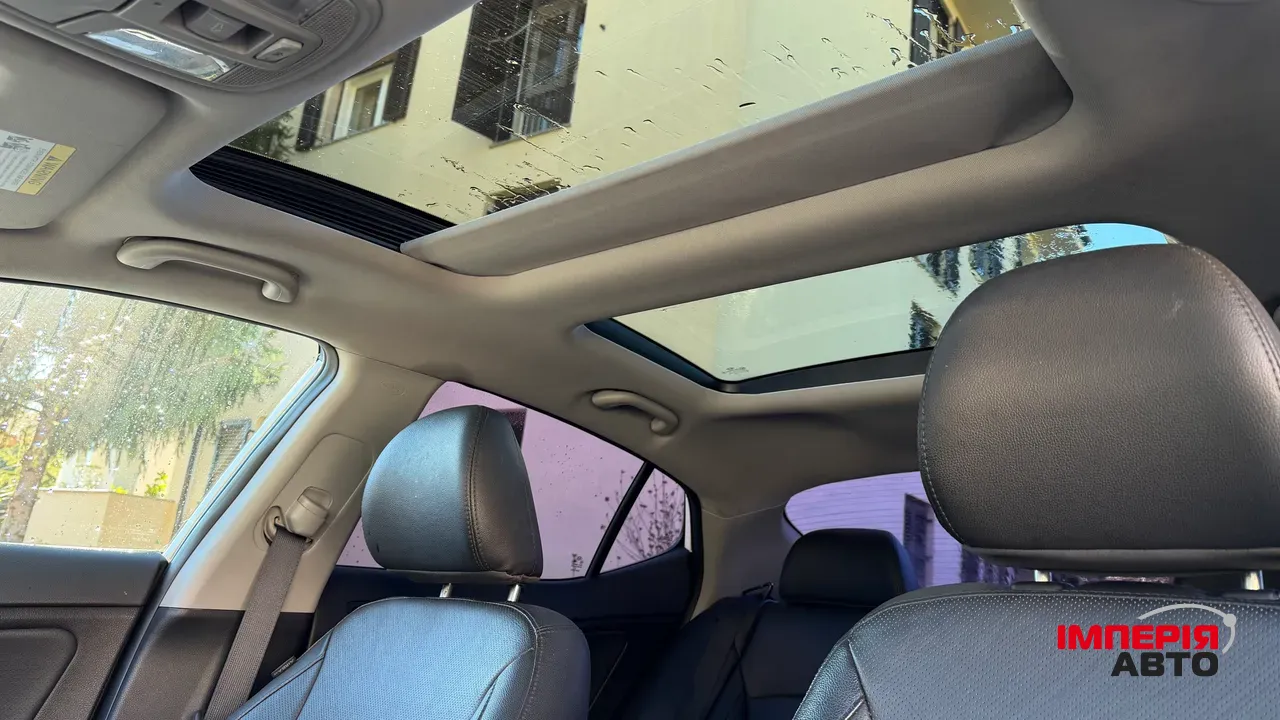 Kia Optima - фото 7