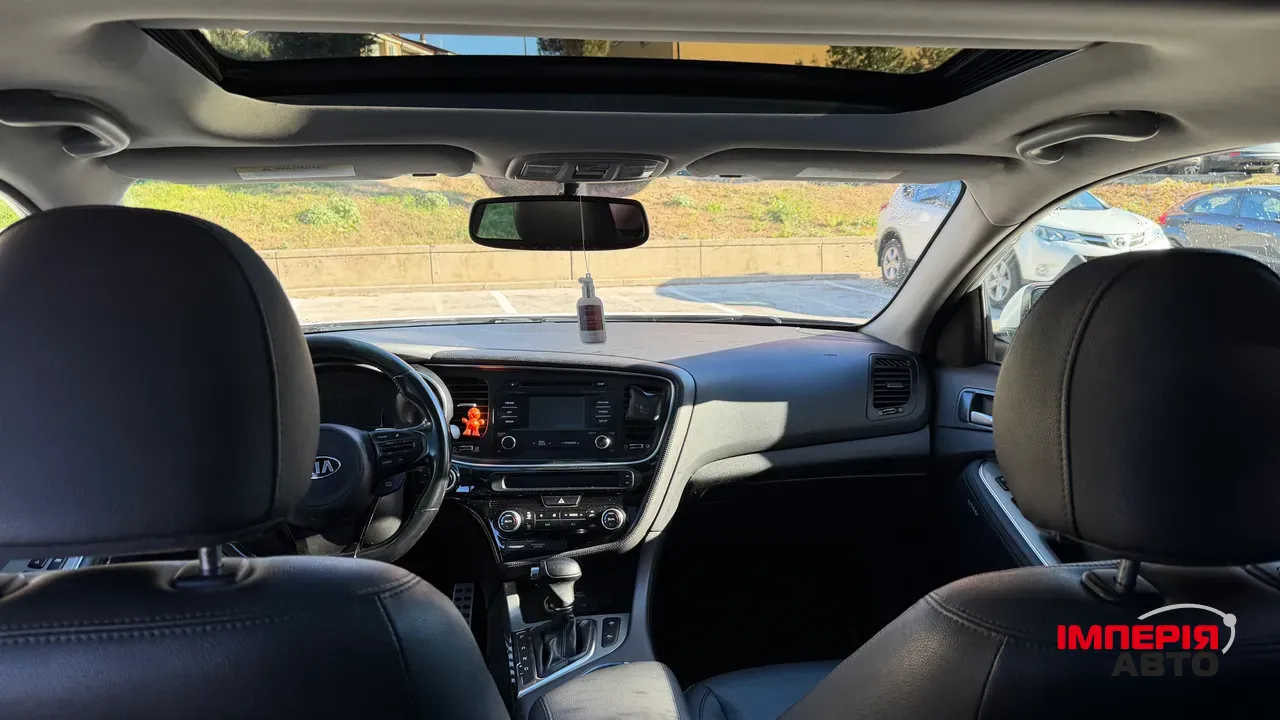 Kia Optima - фото 6