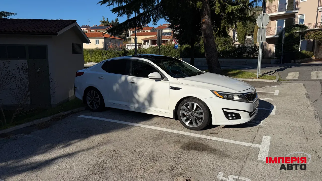 Kia Optima - фото 1