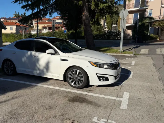 Kia Optima - фото 1