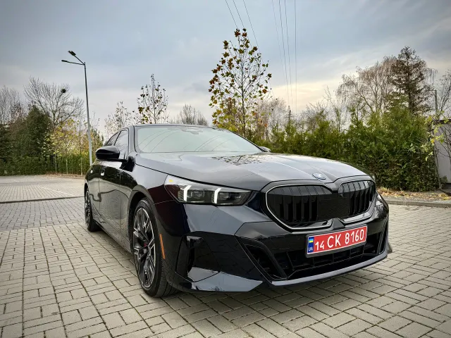 BMW i5 - фото 1