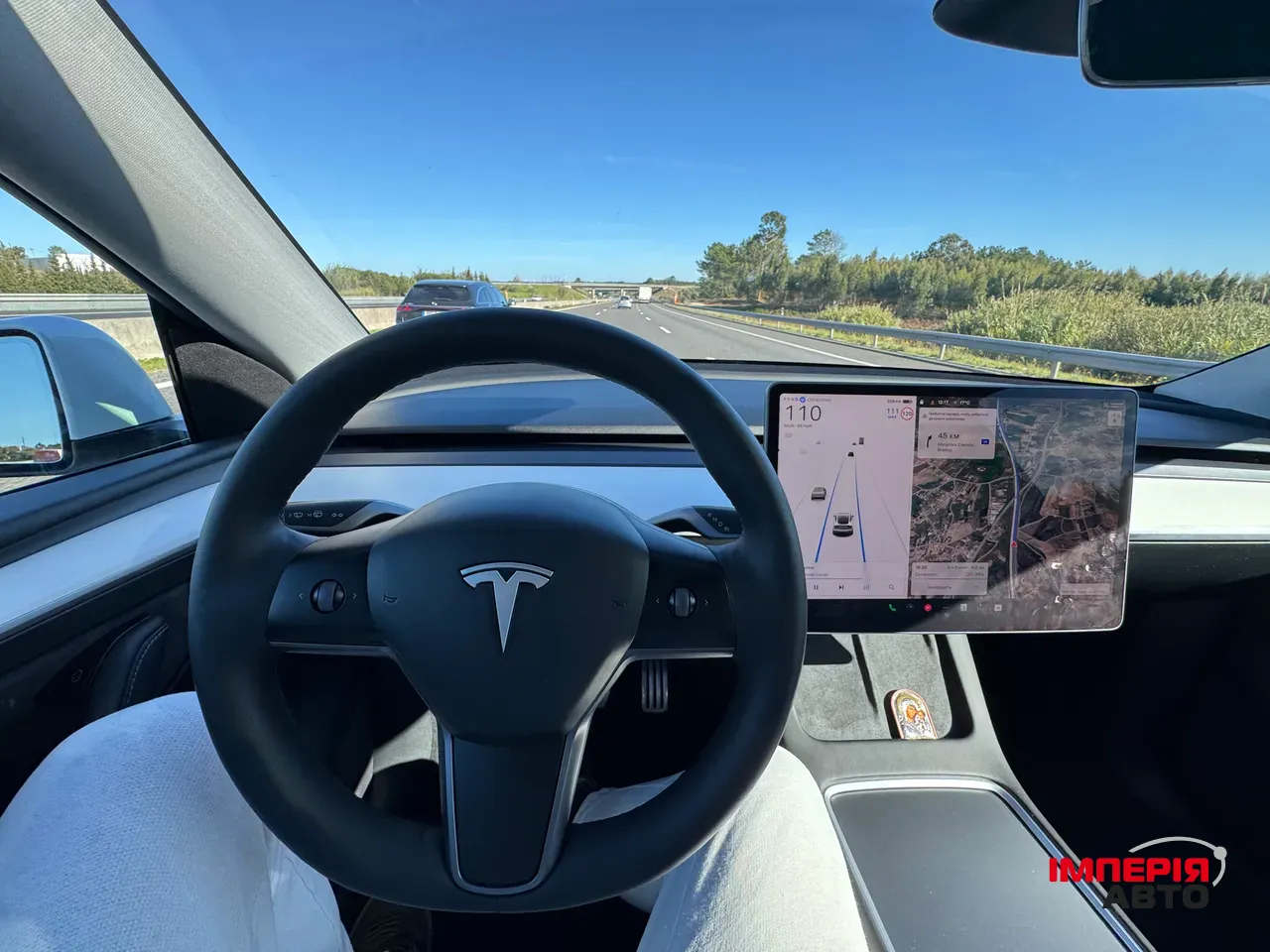 Tesla Model Y - фото 11