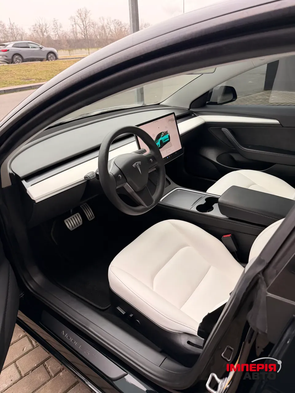 Tesla Model 3 - фото 11