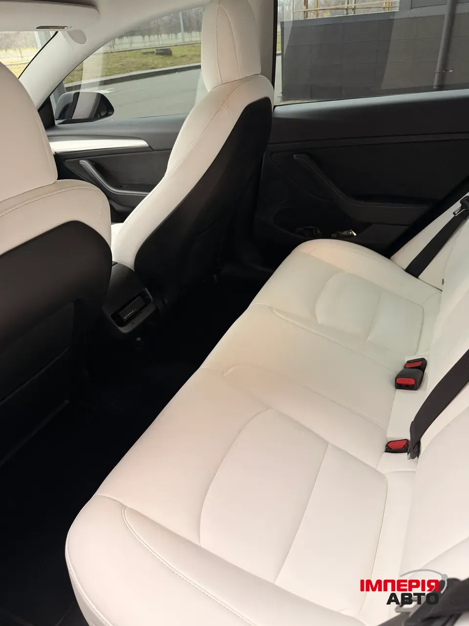 Tesla Model 3 - фото 12