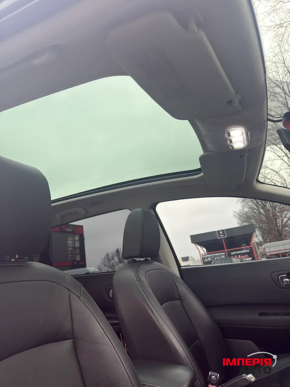 Nissan Qashqai+2 - фото 11