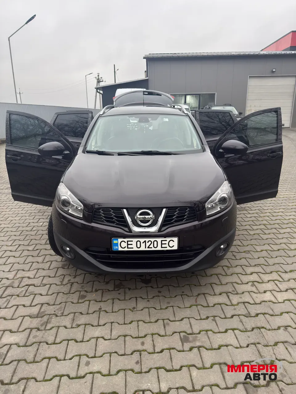 Nissan Qashqai+2 - фото 2