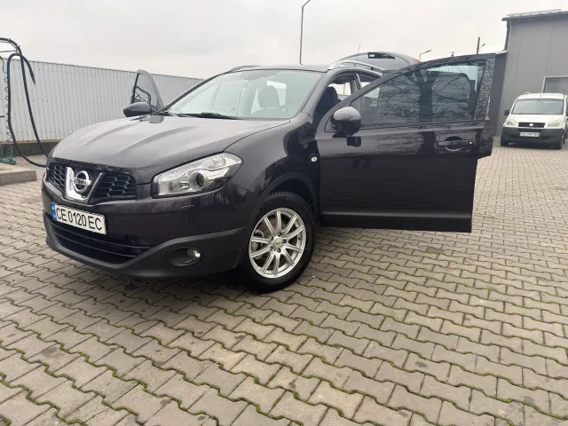 Nissan Qashqai+2 - фото 1