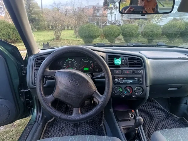 Nissan Primera - фото 5