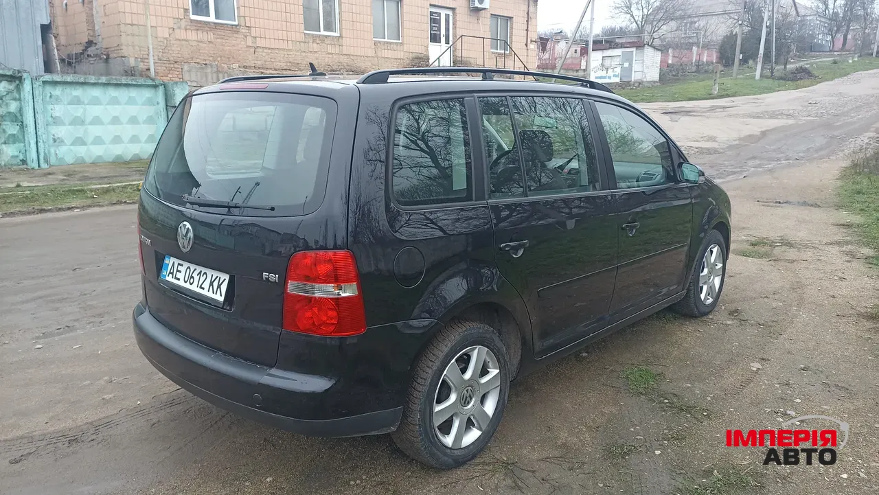 Volkswagen Touran - фото 7