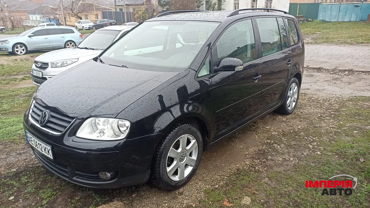 Volkswagen Touran - фото 14