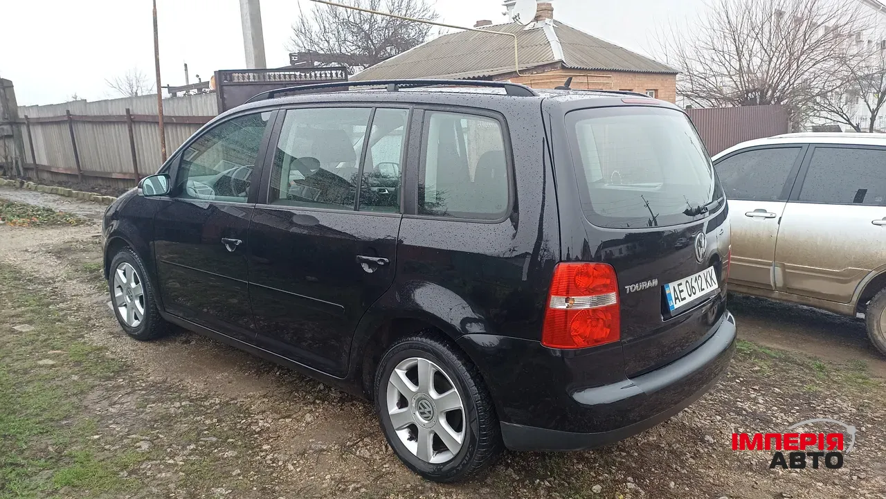Volkswagen Touran - фото 12