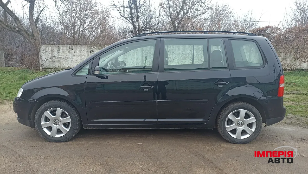 Volkswagen Touran - фото 9