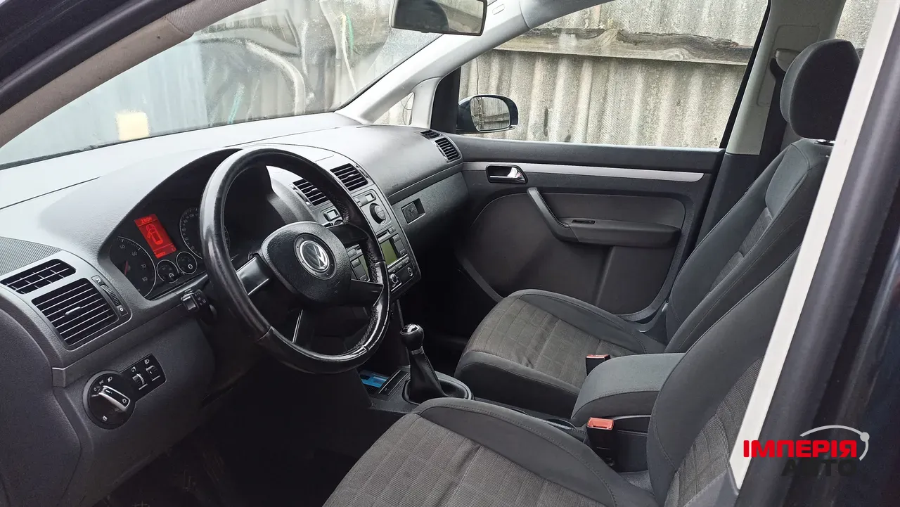 Volkswagen Touran - фото 15