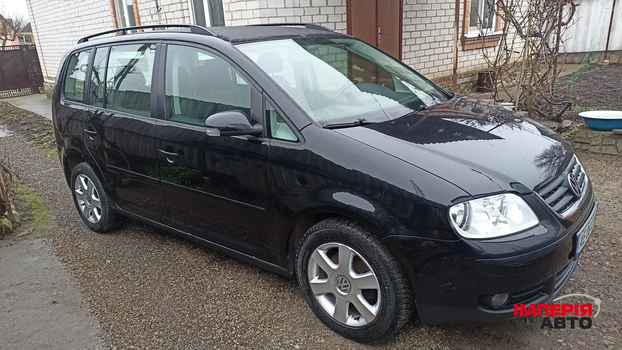 Volkswagen Touran - фото 2