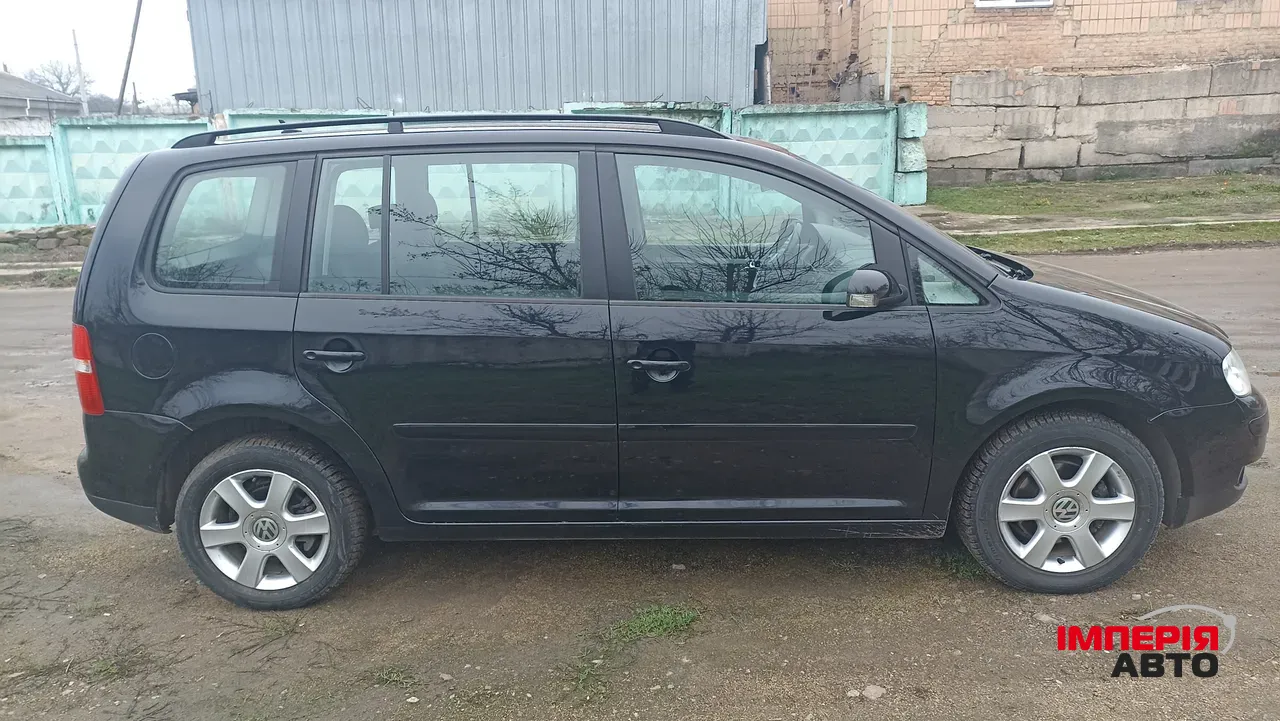 Volkswagen Touran - фото 6