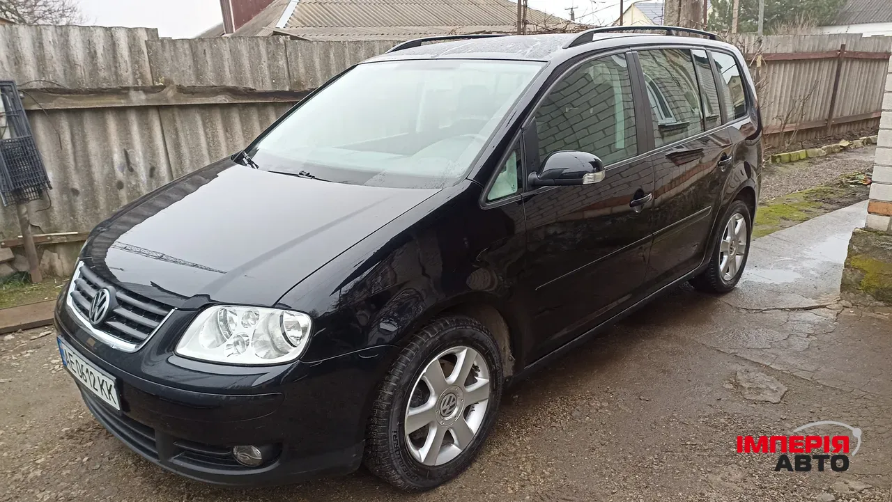 Volkswagen Touran - фото 16