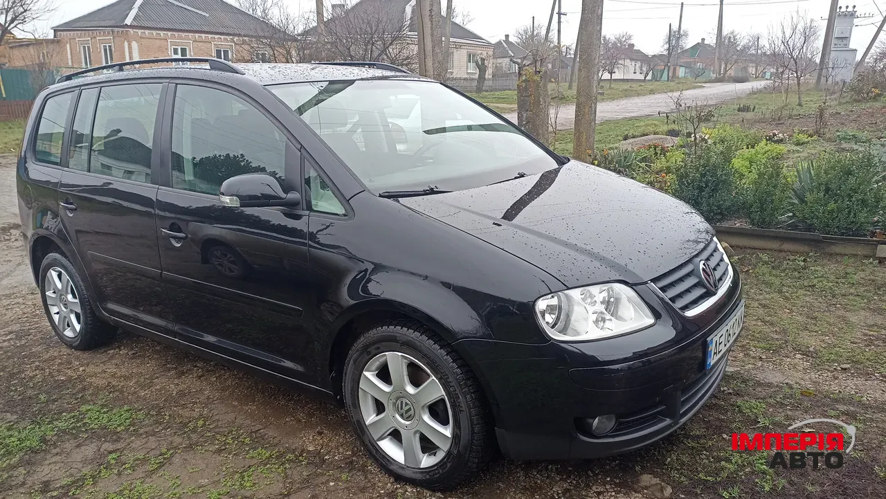 Volkswagen Touran - фото 10