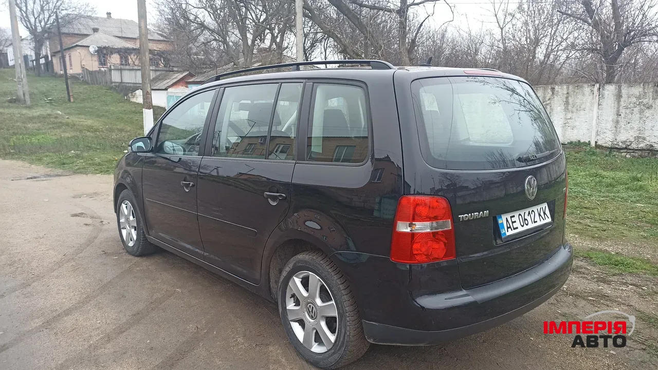 Volkswagen Touran - фото 8