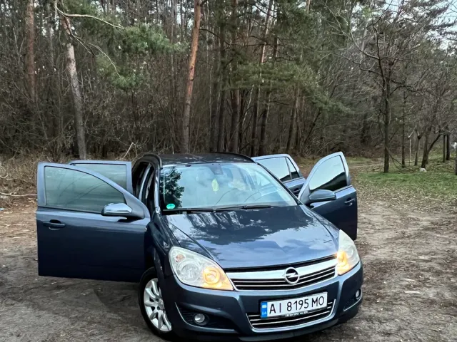 Opel Astra - фото 1