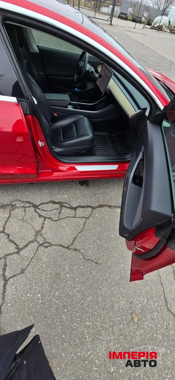Tesla Model 3 - фото 10